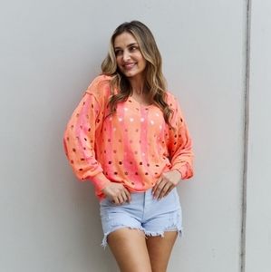 Distressed knit sweater